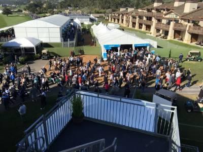 Crowds gather outside concession tents where students are organizing the events