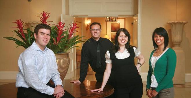 Students dressed professionally in hotel lobby